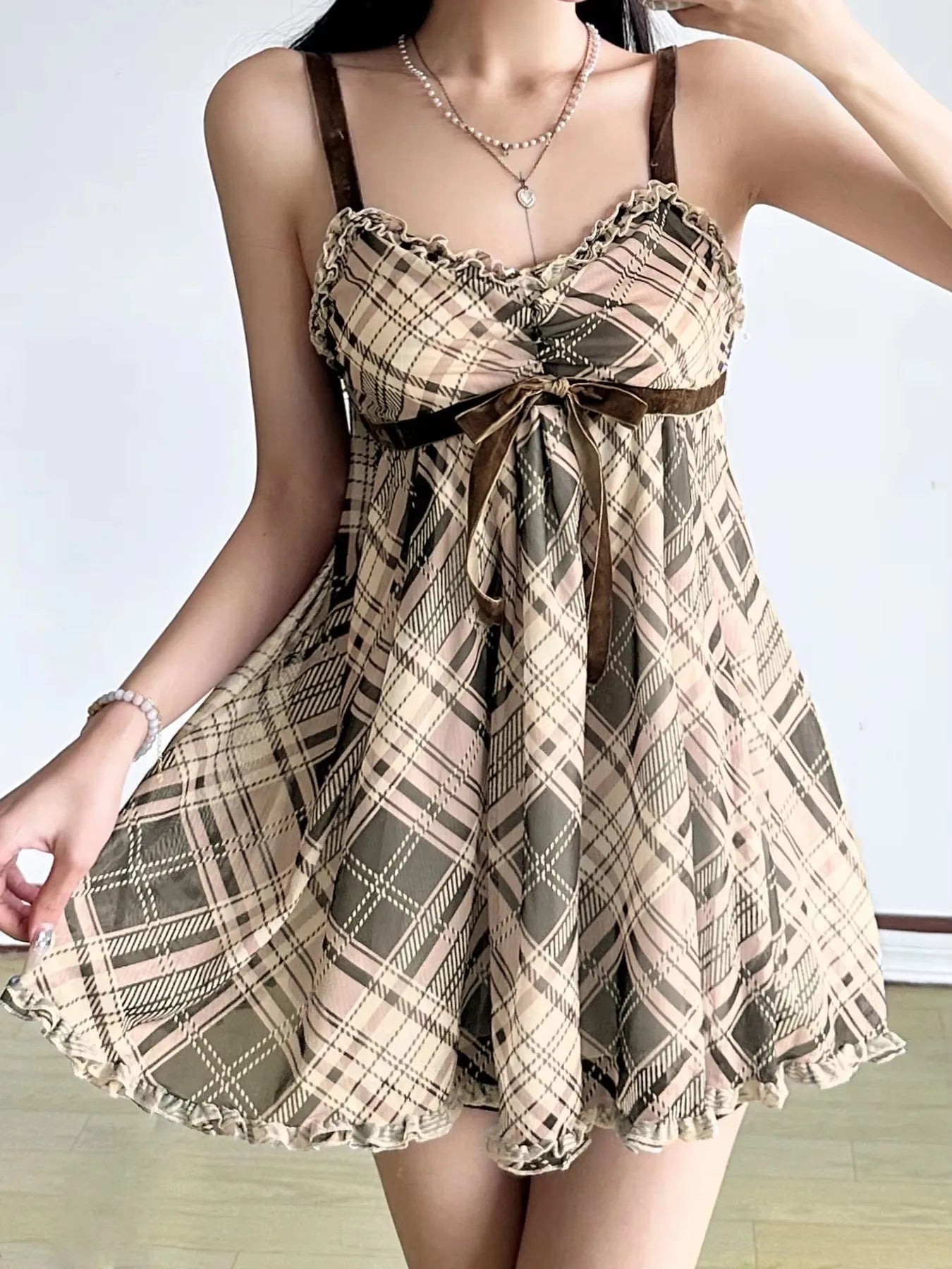 Sweet plaid bow camisole dress top retro style V-neck pleated jumpsuit short skirt loose and versatile